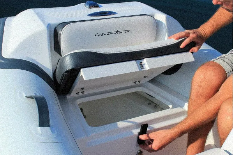 Slide: The Image of 2025 Walker Bay Generation 11 LTE boat storage compartment being accessed. - 3