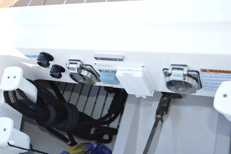 Slide: The Image of 2024 Tiara Yachts EX 60 yacht deck controls and equipment close-up. - 100