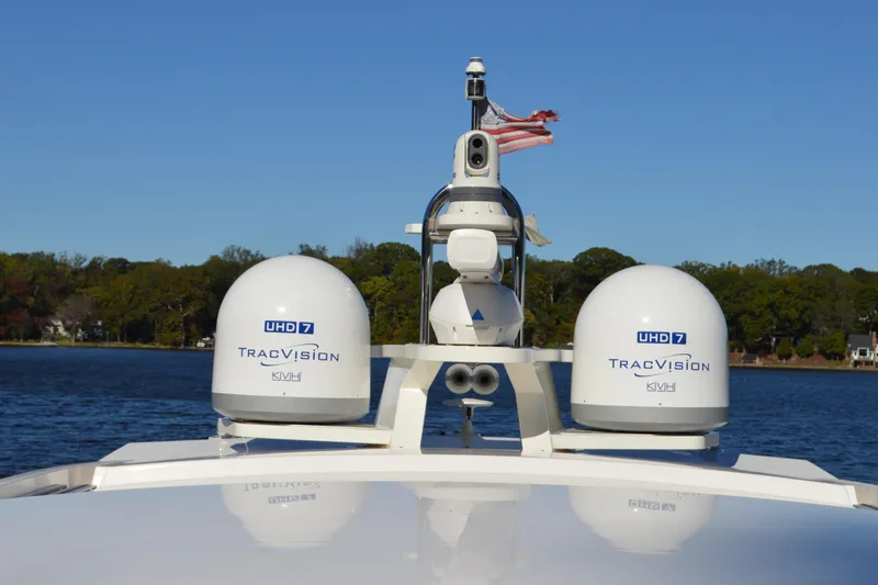 Slide: The Image of 2024 Tiara Yachts EX 60 with TracVision UHD7 satellite domes on deck. - 14