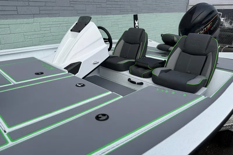 Slide: The Image of 2026 Xpress H18 boat interior with sleek seating and modern design elements. - 6