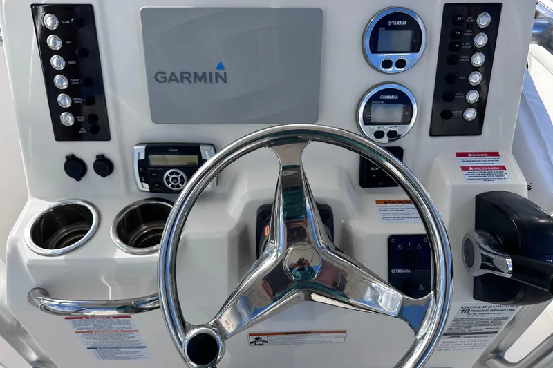 Slide: The Image of Control panel of 2019 Robalo R222 Explorer with Garmin display and Yamaha gauges. - 17