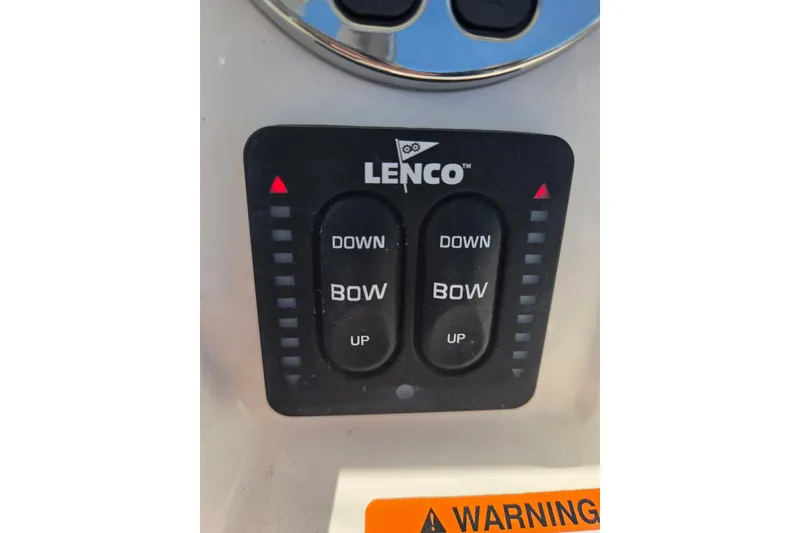 Slide: The Image of Lenco trim tab control panel on 2019 Robalo R222 Explorer boat. - 22