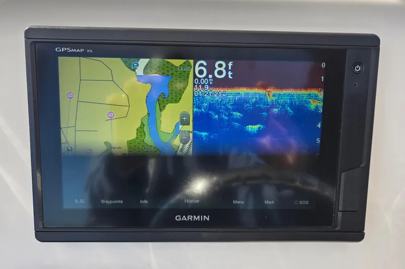 Slide: The Image of Garmin GPSMAP X5 on 2019 Robalo R222 Explorer displaying navigation and sonar data. - 24