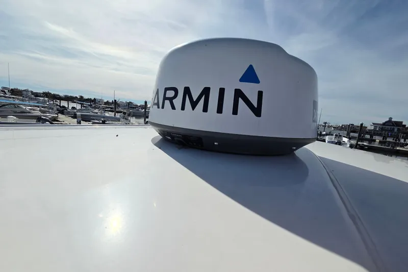 Slide: The Image of 2019 Robalo R222 Explorer with Garmin radar at marina. - 33