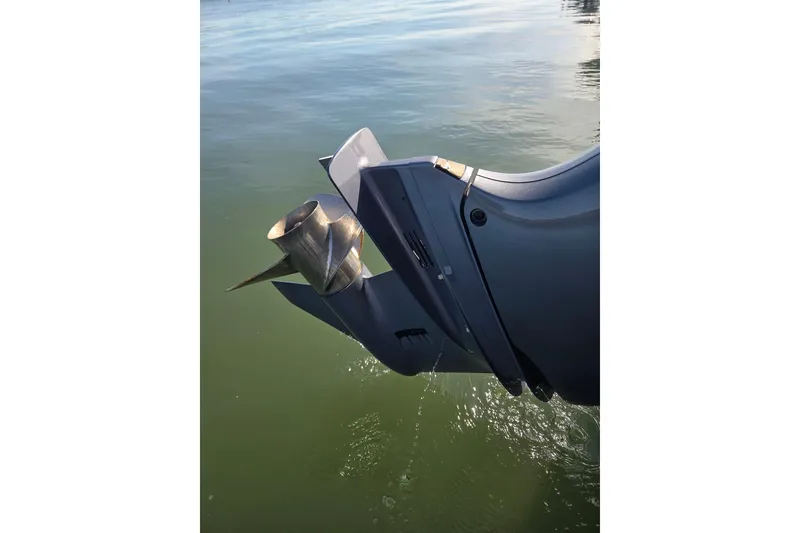 Slide: The Image of 2019 Robalo R222 Explorer boat propeller in water, close-up view. - 36
