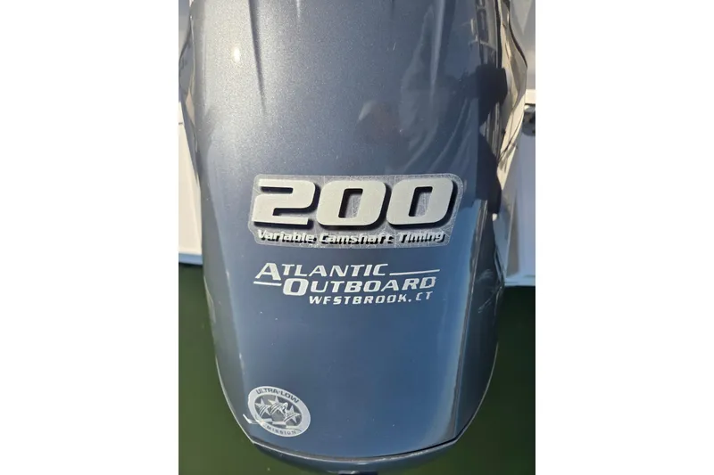 Slide: The Image of Outboard motor with 200 horsepower, variable camshaft timing, on a 2019 Robalo R222 Explorer. - 37