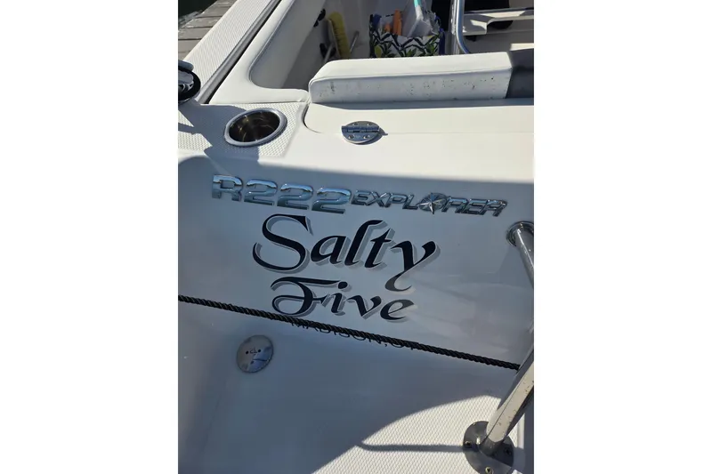 Slide: The Image of 2019 Robalo R222 Explorer boat with "Salty Five" name on the side. - 38