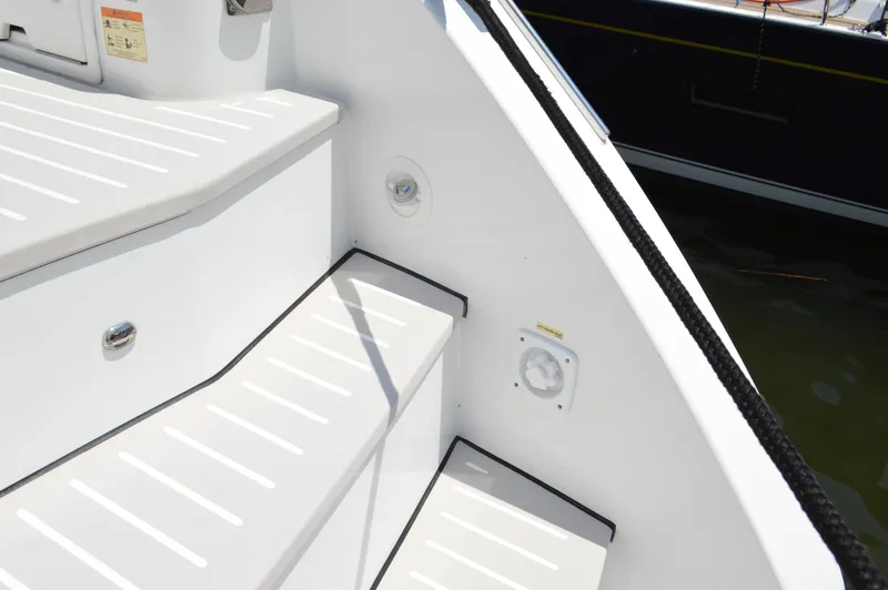 Slide: The Image of Steps on a 2019 Azimut Atlantis 51 yacht, featuring sleek white design and modern fittings. - 15