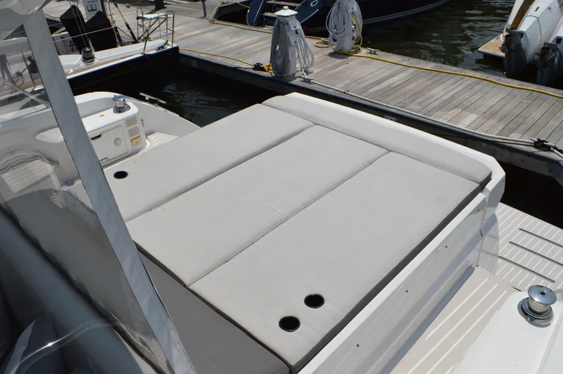 Slide: The Image of 2019 Azimut Atlantis 51 yacht sunbathing deck at marina. - 18