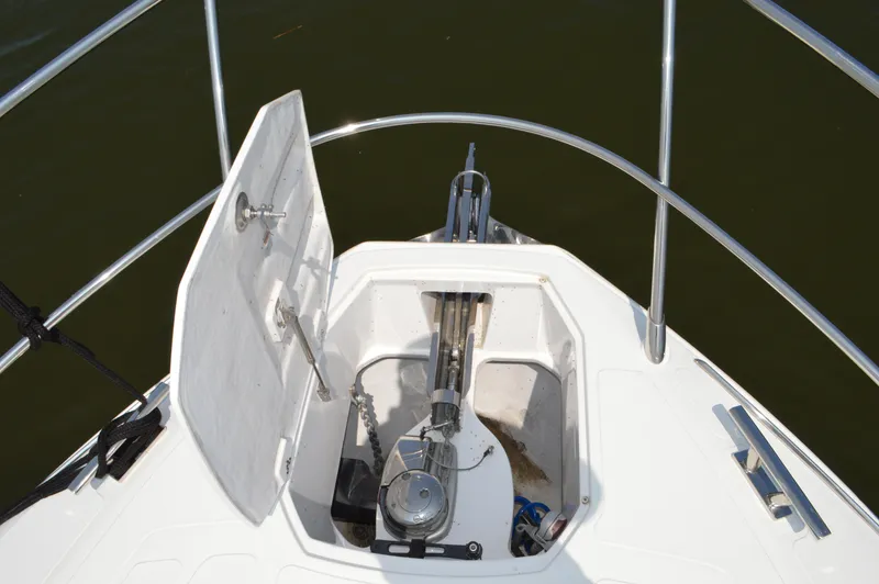 Slide: The Image of 2019 Azimut Atlantis 51 yacht anchor compartment with open hatch and railing. - 23