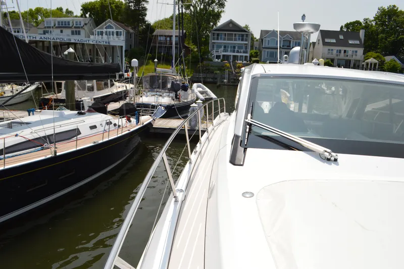 Slide: The Image of 2019 Azimut Atlantis 51 yacht docked at marina with other boats nearby. - 26