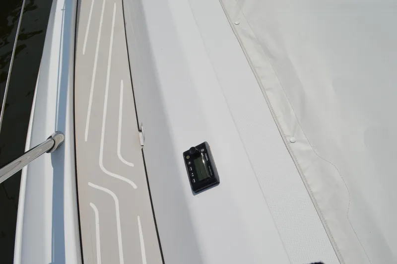 Slide: The Image of Azimut Atlantis 51 yacht deck, 2019 model, featuring sleek design and modern instrumentation. - 27