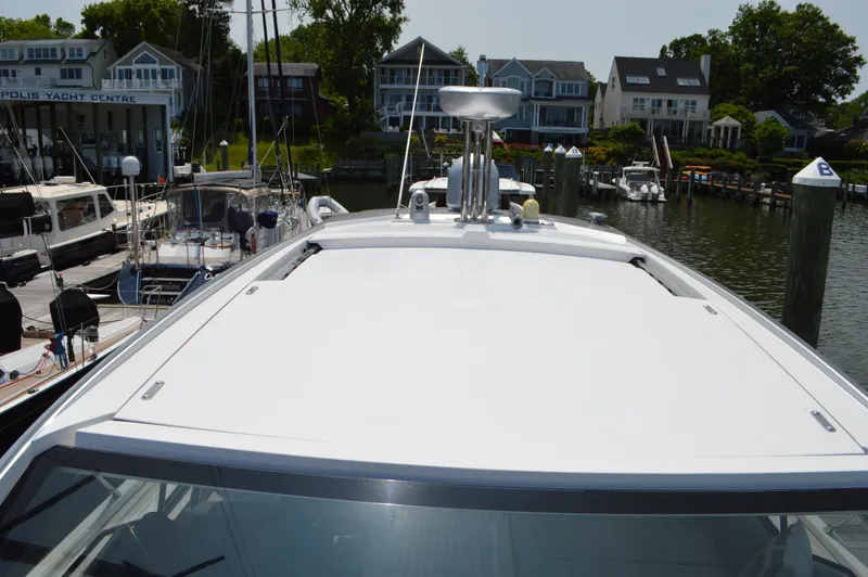 Slide: The Image of 2019 Azimut Atlantis 51 yacht docked at marina, showcasing sleek design and modern features. - 31