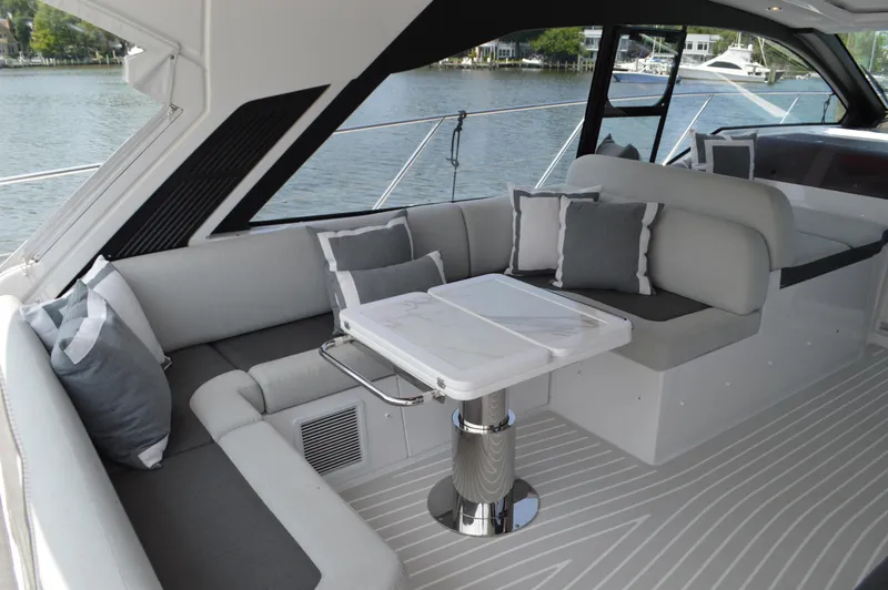 Slide: The Image of Luxurious seating area on 2019 Azimut Atlantis 51 yacht with elegant cushions and table. - 33