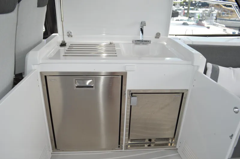 Slide: The Image of 2019 Azimut Atlantis 51 yacht kitchenette with stainless steel appliances and sink. - 38