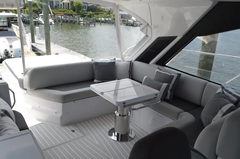 Slide: The Image of Luxurious seating area on 2019 Azimut Atlantis 51 yacht, featuring elegant design and waterfront view. - 44