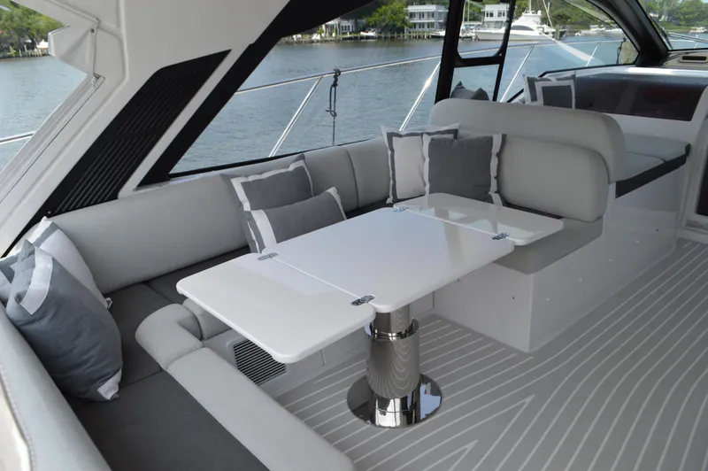 Slide: The Image of Luxurious interior of 2019 Azimut Atlantis 51 yacht with elegant seating and table. - 45