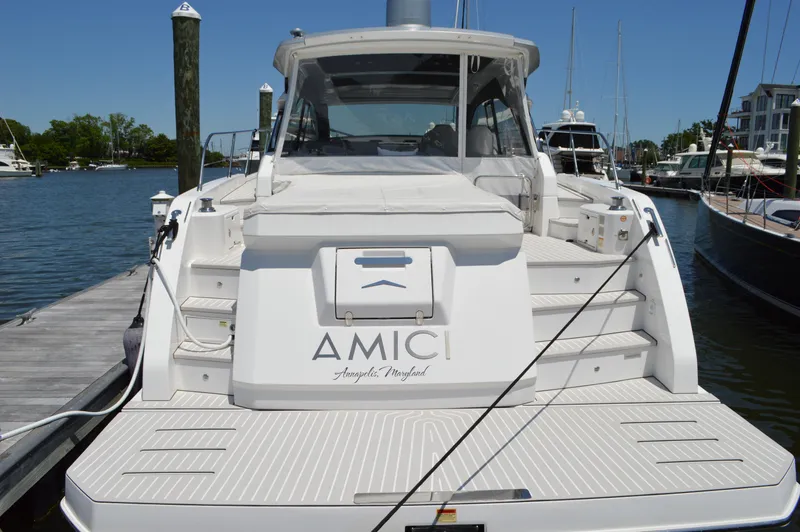 Slide: The Image of 2019 Azimut Atlantis 51 yacht docked at marina, rear view. - 8