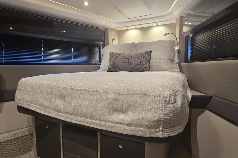 Slide: The Image of Luxurious bedroom interior of 2019 Azimut Atlantis 51 yacht with elegant bedding. - 61