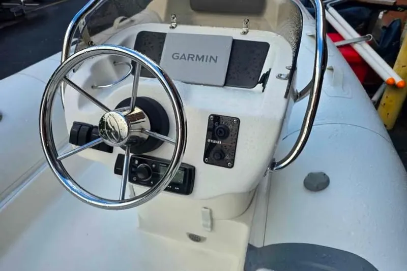 Slide: The Image of 2013 Walker Bay Generation 400 DLX boat console with Garmin navigation system. - 3