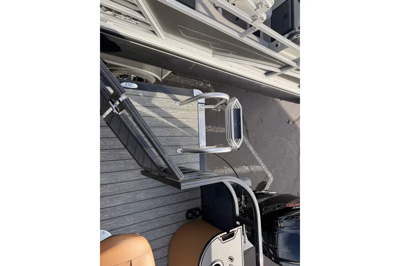Slide: The Image of 2026 Ranger 220F boat ladder and deck, showcasing sleek design and functionality. - 12