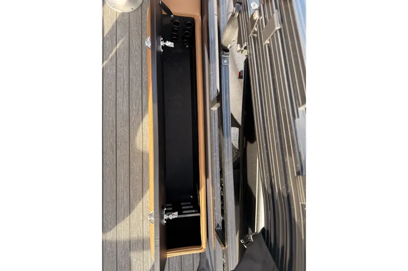Slide: The Image of Storage compartment on a 2026 Ranger 220F boat, featuring sleek design and secure latches. - 9
