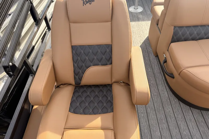 Slide: The Image of Luxurious tan and black leather seat on 2026 Ranger 220F boat. - 16