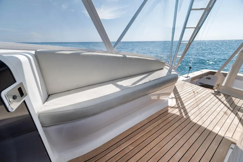 Slide: The Image of 2012 Spencer Yachts Express boat with sleek seating and ocean view. - 13