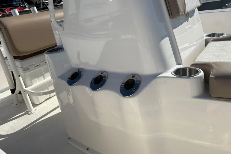 Slide: The Image of 2026 Sundance B20CCR boat console with cup holders and seating. - 10