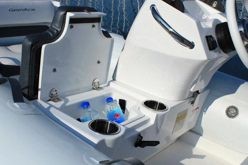 Slide: The Image of 2025 Walker Bay Generation 11 LTE boat console with storage and cup holders. - 4