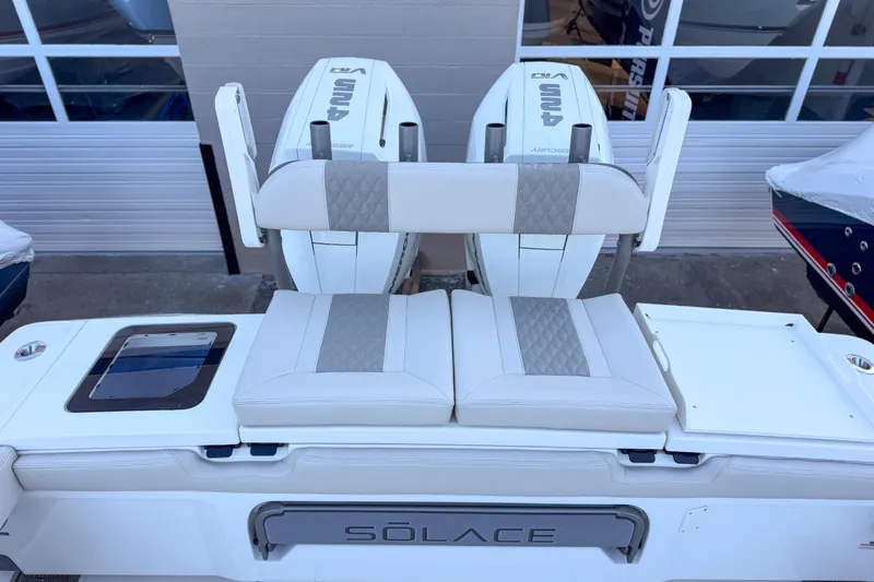 Slide: The Image of Solace 32 CS 2026 with dual outboard engines. - 12
