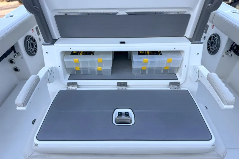 Slide: The Image of Solace 32 CS 2026 boat with storage compartment and speakers. - 19