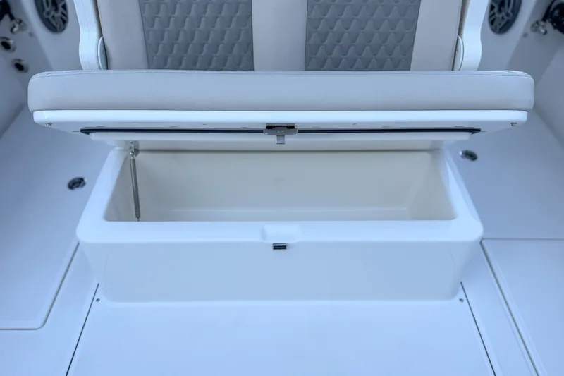 Slide: The Image of Solace 32 CS 2026 boat seat with storage compartment. - 20