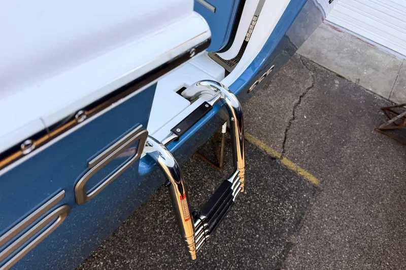 Slide: The Image of Solace 32 CS 2026 boat with retractable ladder. - 24