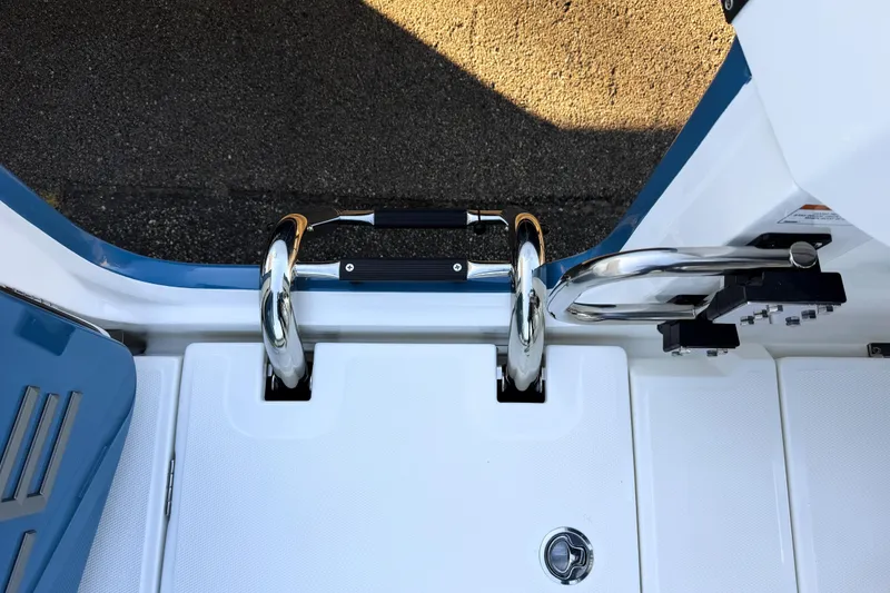 Slide: The Image of Solace 32 CS 2026 boat door with stainless steel handles. - 25
