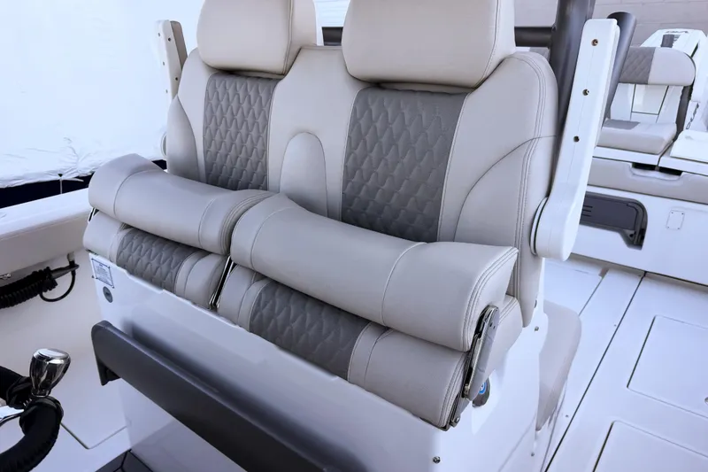 Slide: The Image of Luxurious seating in Solace 32 CS boat, model year 2026. - 33