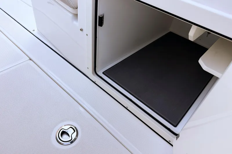 Slide: The Image of Solace 32 CS 2026 boat cabin with storage compartment. - 35