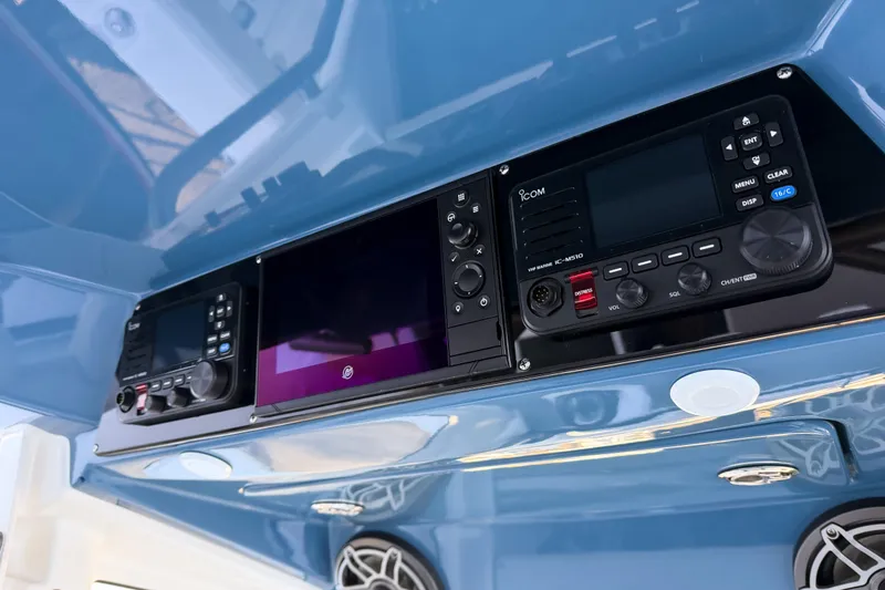 Slide: The Image of 2026 Solace 32 CS boat electronics and control panel. - 38