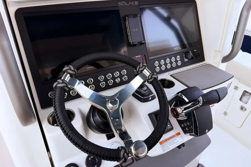Slide: The Image of Helm console of Solace 32 CS boat, year 2026. - 41