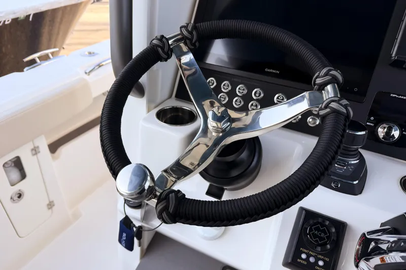 Slide: The Image of Helm of Solace 32 CS boat, model year 2026. - 42