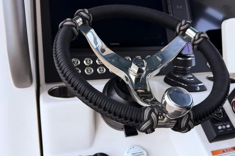 Slide: The Image of Solace 32 CS 2026 steering wheel with modern controls. - 43