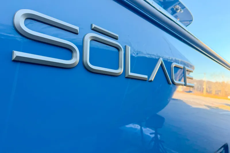 Slide: The Image of Close-up of Solace 32 CS boat logo, year 2026. - 5