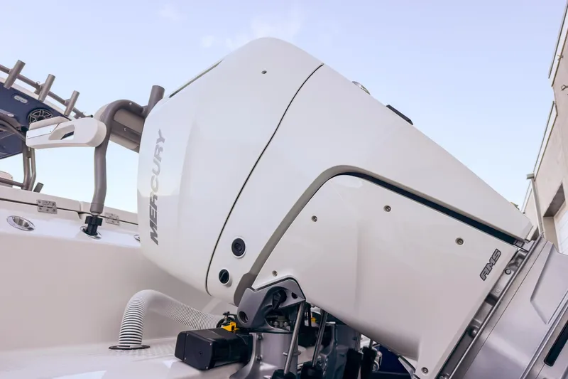 Slide: The Image of 2026 Solace 32 CS boat with Mercury engine. - 8