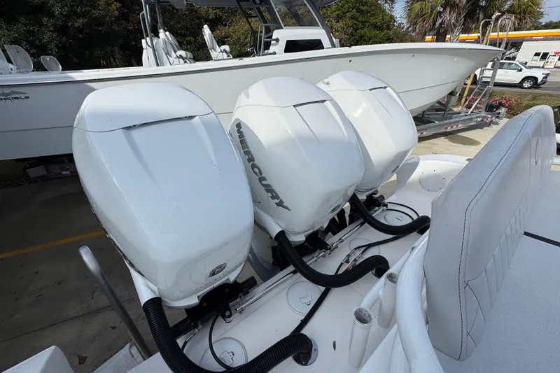 Slide: The Image of 2023 Fountain 38 Tournament Edition boat with triple Mercury outboard engines. - 34