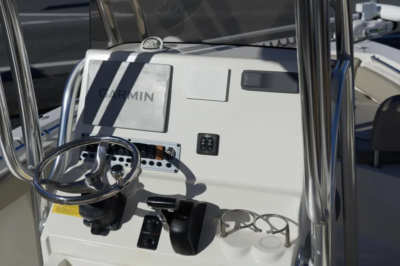 Slide: The Image of Control panel of 2022 Key West 219 FS boat with Garmin navigation system. - 9