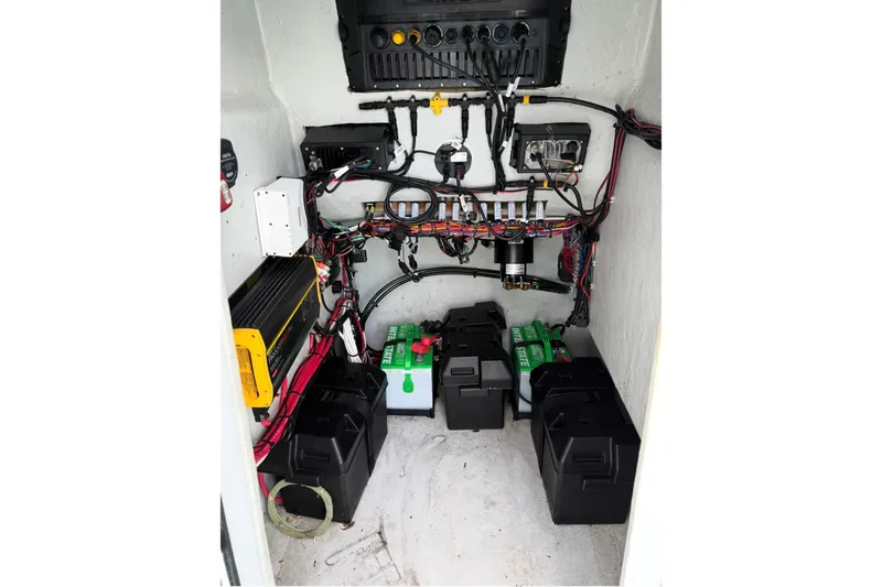 Slide: The Image of Electrical system of a 2019 Latitude Tournament Boats 25, featuring batteries and wiring. - 16