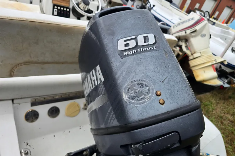 Slide: The Image of Yamaha 60 High Thrust outboard motor on a 2010 Nautica RIB 15 boat. - 6
