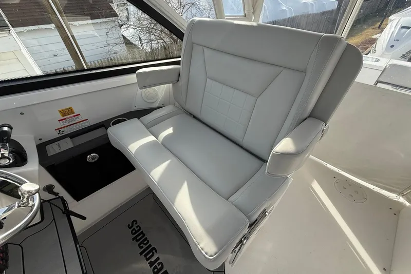 Slide: The Image of Luxury seating on 2020 Everglades 340 Dual Console boat, featuring sleek design and comfort. - 26