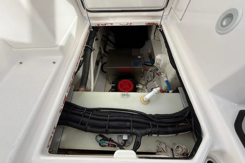 Slide: The Image of Engine compartment of 2020 Everglades 340 Dual Console boat, showing wiring and components. - 37