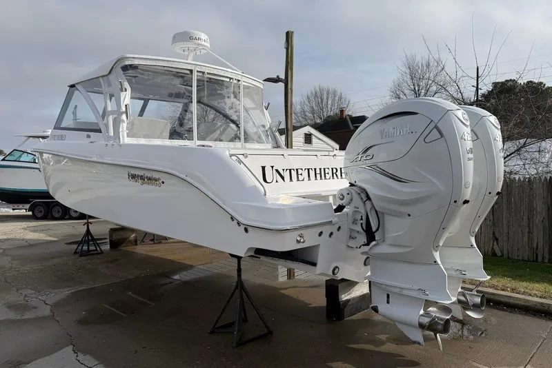 Slide: The Image of 2020 Everglades 340 Dual Console boat with twin Yamaha engines on display. - 8